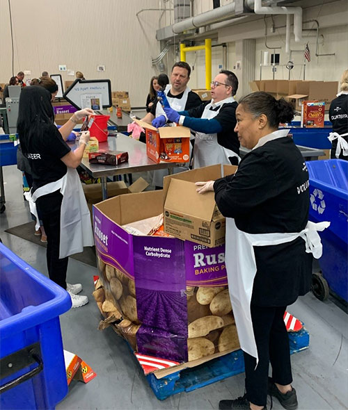 Image of AmeriHealth Caritas Ohio associates sorting donations